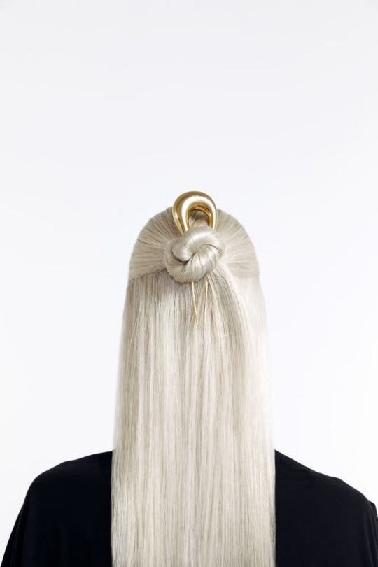 clip de pelo en forma de gota de agua en oro de 24 quilates